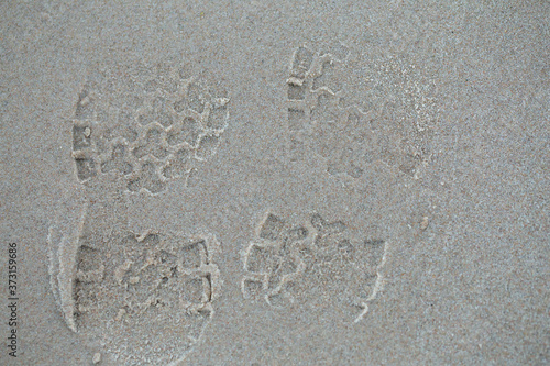 Sandal prints on the sand