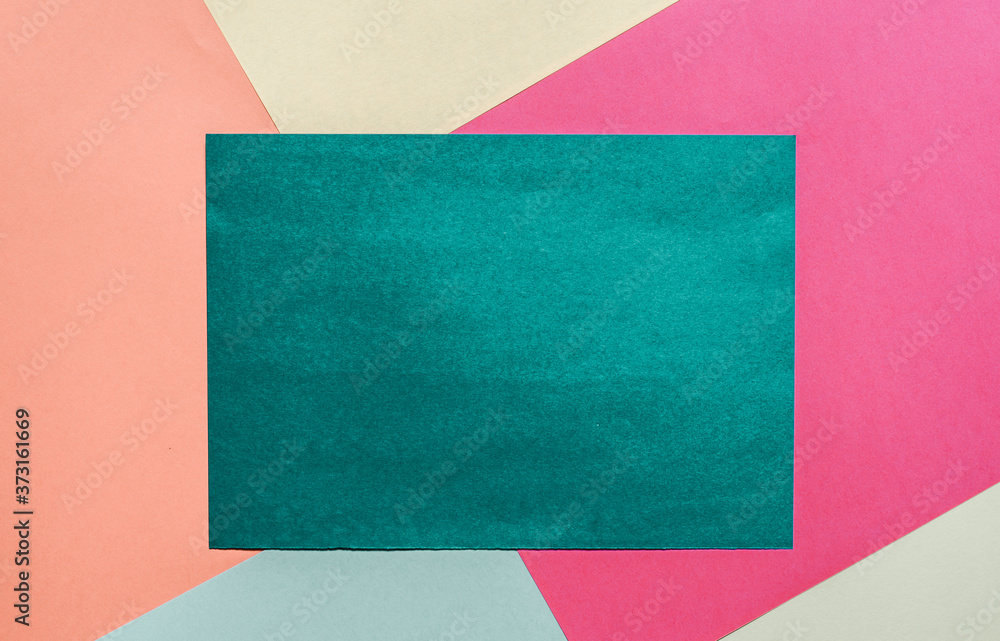 turquoise sheet of paper with a place for your text on a colorful background. turquoise sheet of paper with a place for your text on a colorful background.