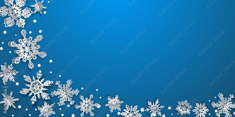 Christmas background with volume paper snowflakes with soft shadows on light blue background Christmas background with volume paper snowflakes with soft shadows on light blue background
