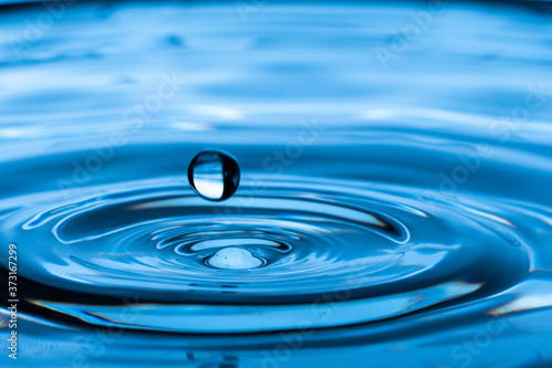 Water drop splash. Blue water 