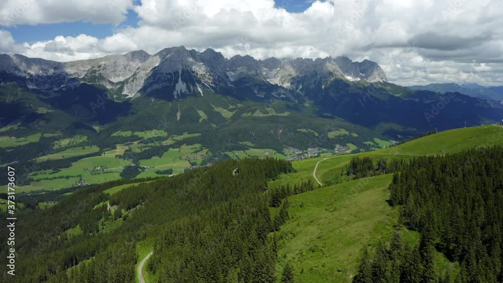 Aerial view of pine forest in Ellmau, Wilderkaiser mountains peaks, Austria Aerial view of pine forest in Ellmau, Wilderkaiser mountains peaks, Austria
