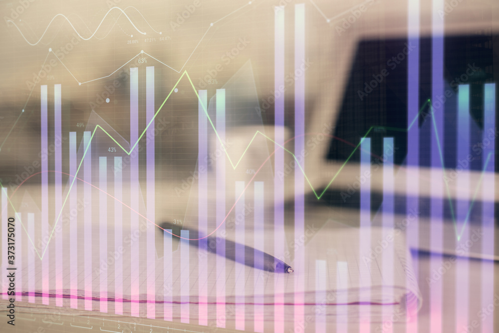 Double exposure of financial graph drawings and desk with open notebook background. Concept of forex market Double exposure of financial graph drawings and desk with open notebook background. Concept of forex market