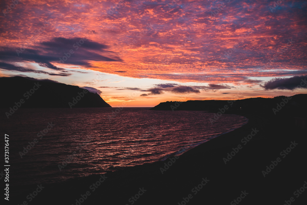 sunset over the sea in Norris point, Newfoundland, Canada