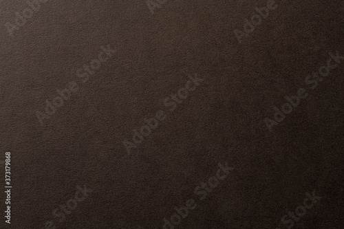 茶色いレザー調のの質感のある紙の背景テクスチャー