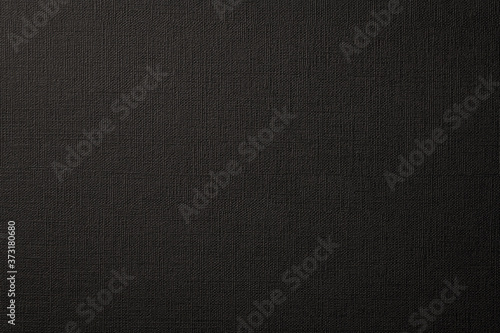 黒い絹目調の模様のある紙の背景テクスチャー