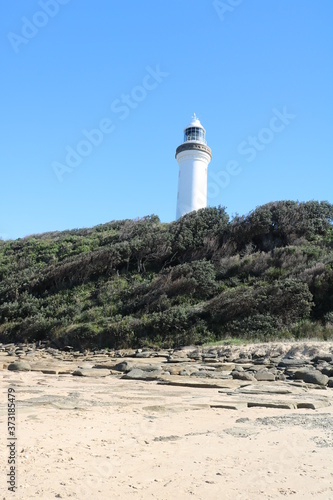 Lighthouse at Norah Head Sitting High on a Cliff