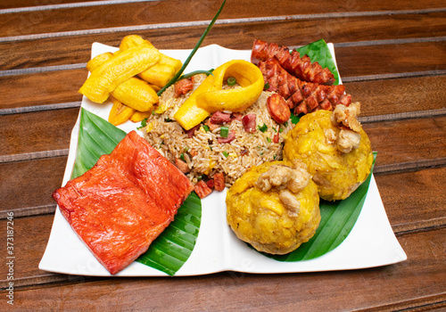 Peruvian food, Amazonian dish jerky, chorizo, juane, fried plantain and pork