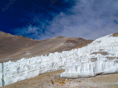 Bizarre snow formation at the hillside of Las Tortolas mountain in the Elqui Valley photo