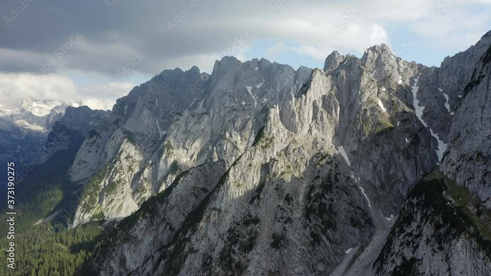 Aerial fly along Dachstein summit mountains near Hinterer Gosausee lake Upper Austria Aerial fly along Dachstein summit mountains near Hinterer Gosausee lake Upper Austria