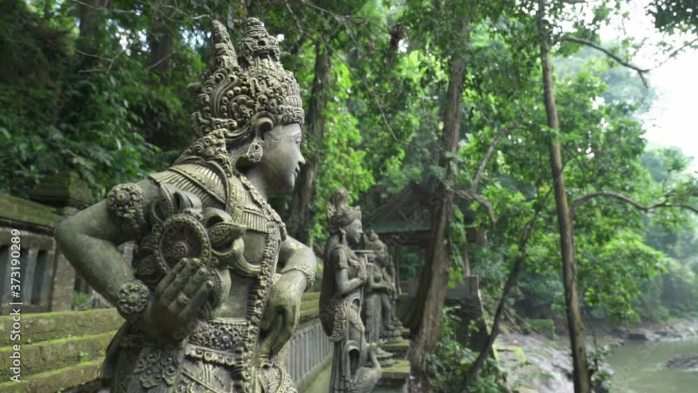 Bali, Indonesia - Kemenuh Monkey River and Jungle in Gianyar - Beautiful Traditional Balinese Statue Statues Hindu Gods Prayer Temple Bali, Indonesia - Kemenuh Monkey River and Jungle in Gianyar - Beautiful Traditional Balinese Statue Statues Hindu Gods Prayer Temple