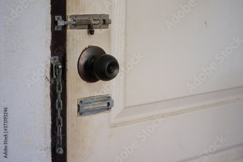 Inner chamber door There are doorknobs, room latches, and door locks