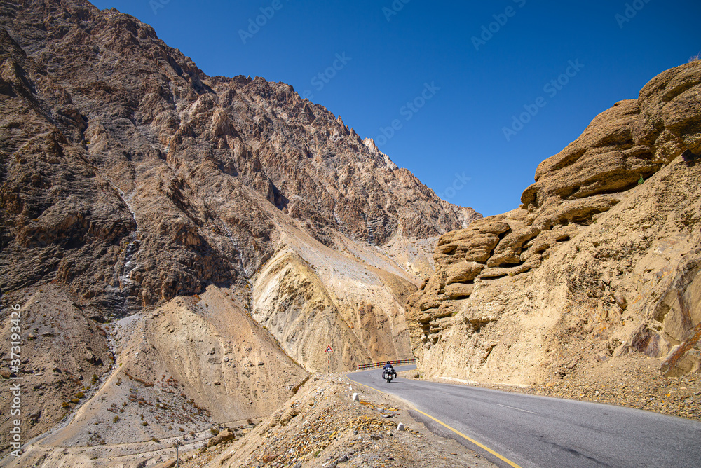 Leh Kargil Hiway in Ladakh India with touring motor bike through steep mountains