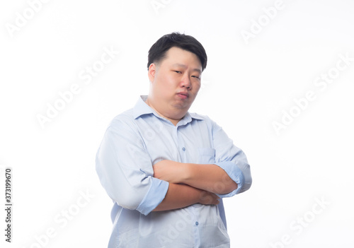 Portrait of Young Fat Asian business man isolated on white background.