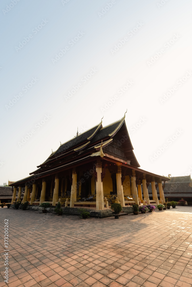 Fototapeta premium Courtyard of Wat Si Saket in Vientiane, Laos at sunrise