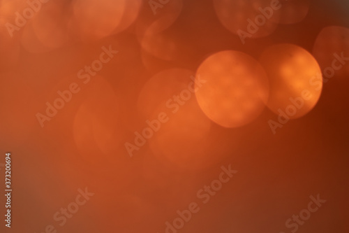 Orange bokeh and yellow blur abstract