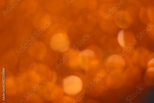 Orange bokeh and yellow blur abstract