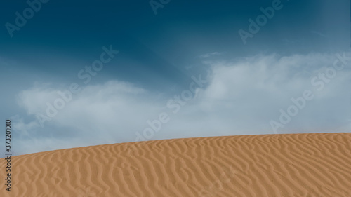 Sounthern California Sand Dunes and blue sky with some clouds, desert copy-space and landscape photo