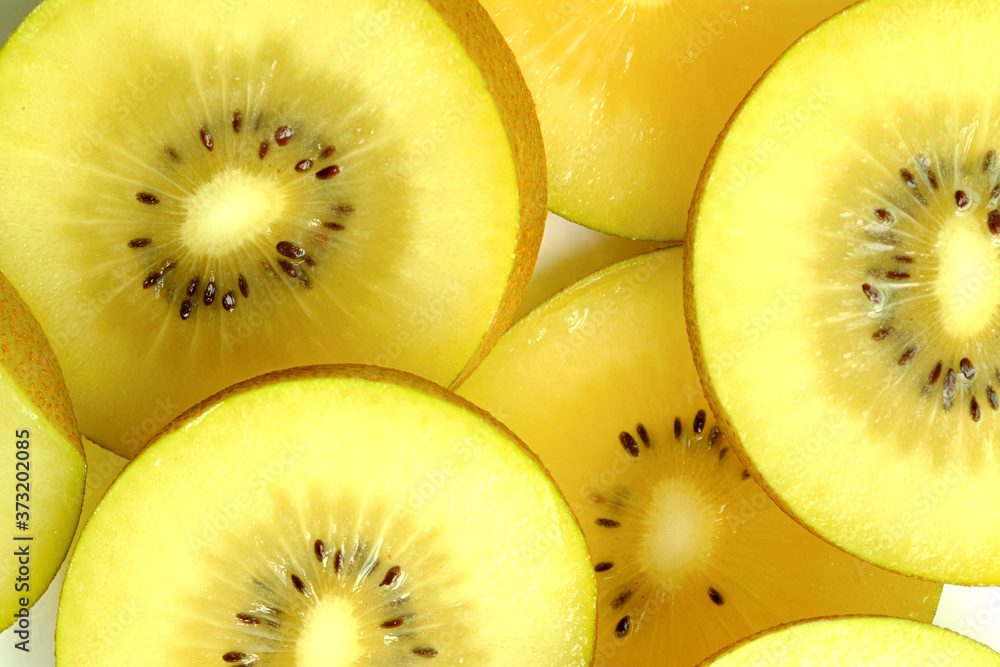 background Golden Kiwi Fruit Healthy Diet Sliced.Healthy lifestyle and vitamin concepts background Golden Kiwi Fruit Healthy Diet Sliced.Healthy lifestyle and vitamin concepts