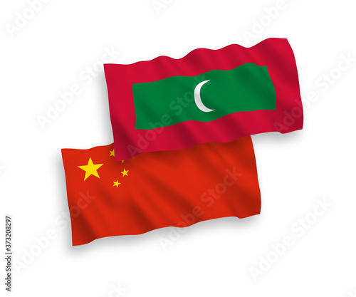 Flags of Maldives and China on a white background
