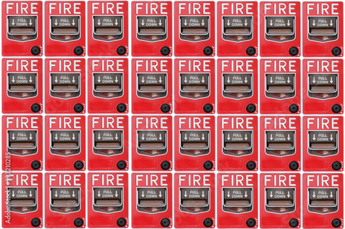 Red switch fire alarm presented as background Ideal for design, image and text insertion.