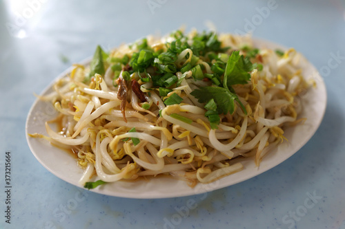 Stir-fried bean sprout with soy sauce, Chinese food.