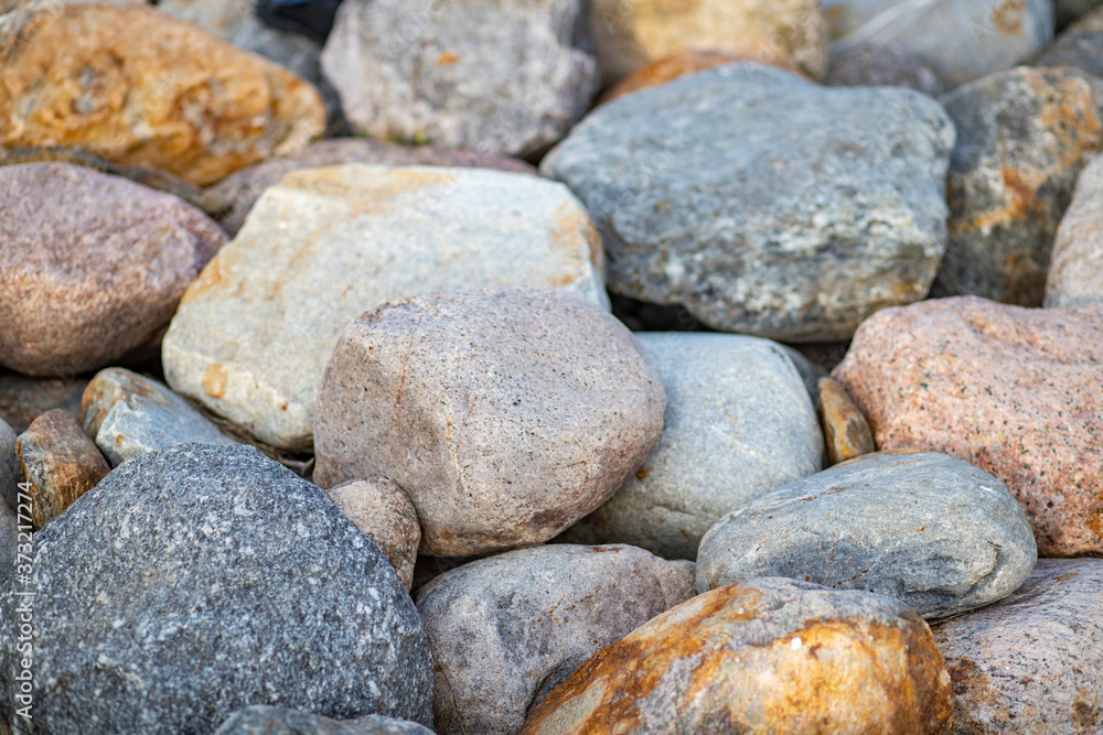 Texture of granite boulders of different shades Texture of granite boulders of different shades