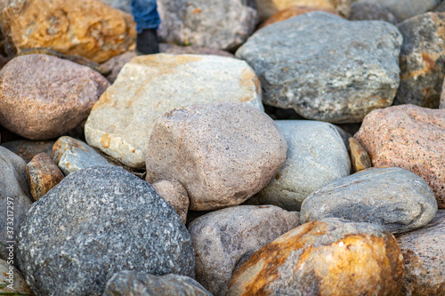 Texture of granite boulders of different shades