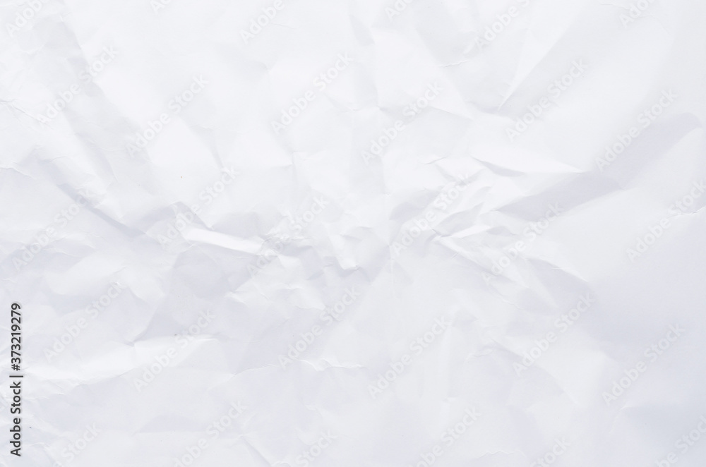 Naklejka premium white crumpled paper texture background.
