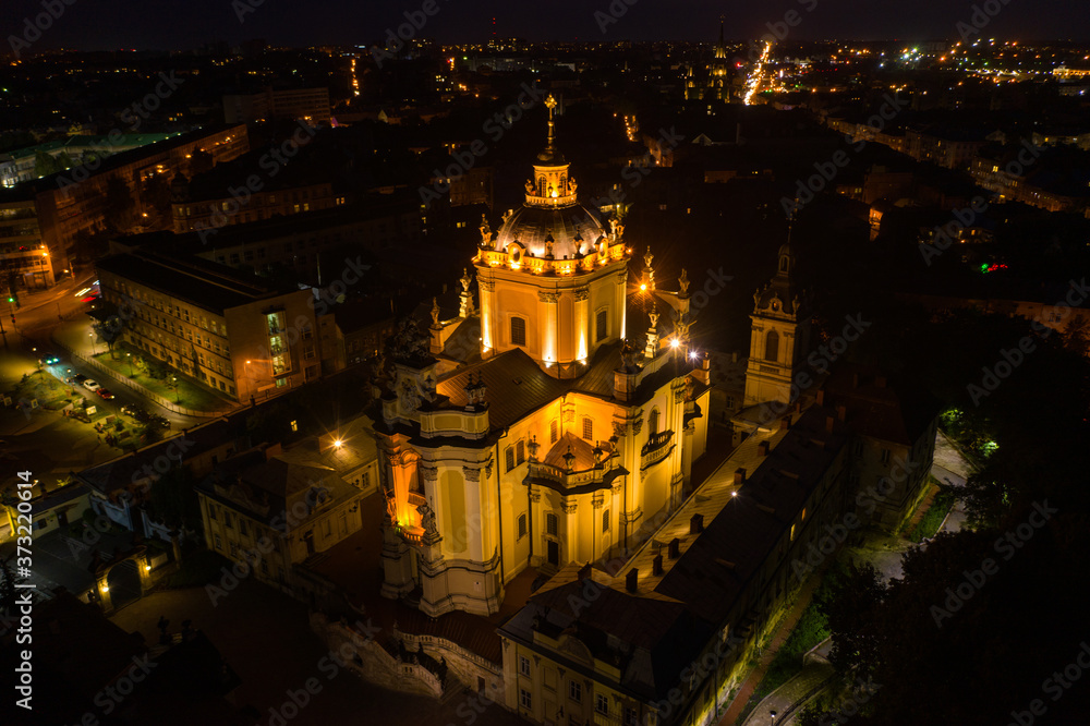 Aerial view on St. George's Cathedral in Lviv, Ukraine from drone at night