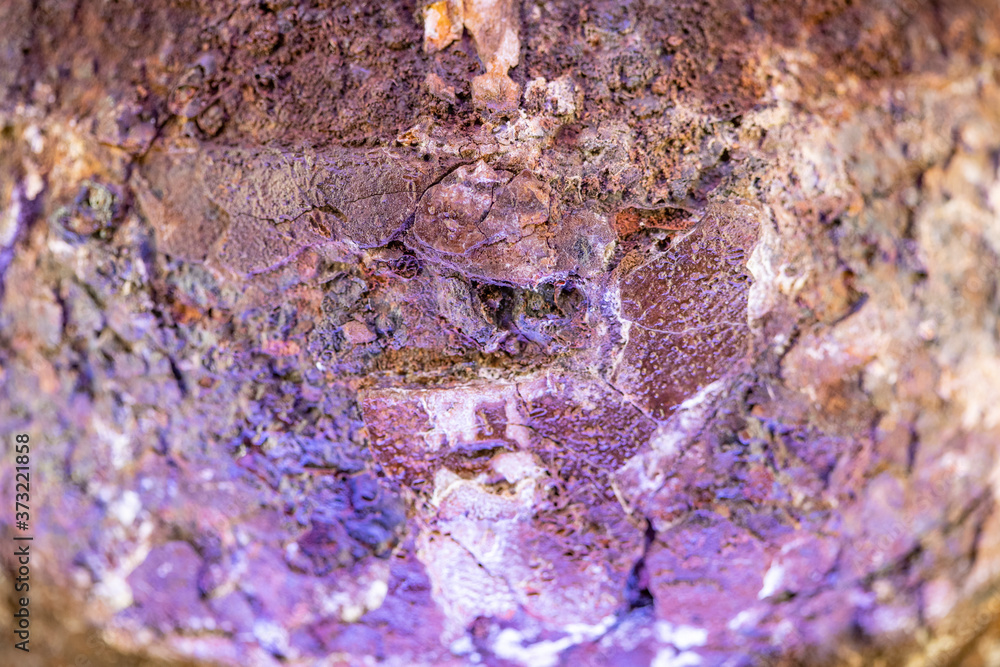 Texture of rusty metal backlit by purple light Texture of rusty metal backlit by purple light
