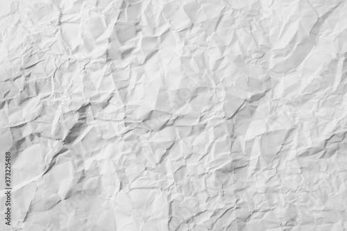 White paper wrinkled on the background and designed