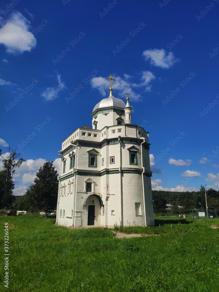 A NEW JERUSALEM MONASTERY, Istra, Moscow region, Russia. This church is a copy of Church of the Holy Sepulchre in Jerusalem. An old monastery in the sunshine day at summer season.