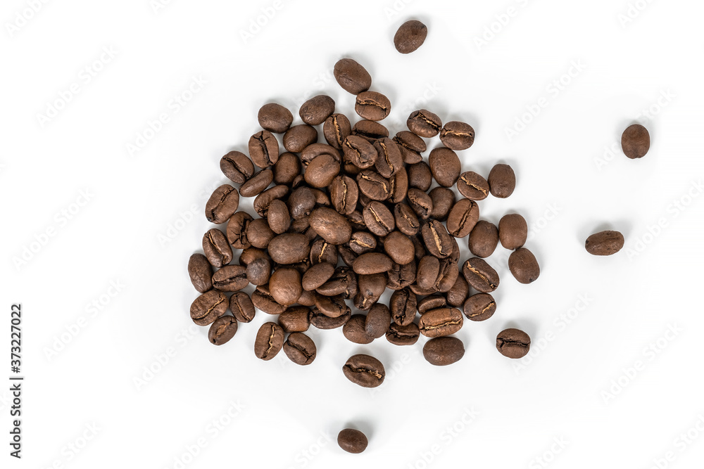 Roasted coffee beans on a white background Roasted coffee beans on a white background