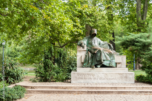 Budapest, Hungary: Monument to an anonymus at Vajdahunyad Castle located in Budapest City Park, aka Varosliget. Statue is from Miklos Ligeti (1871-1944).