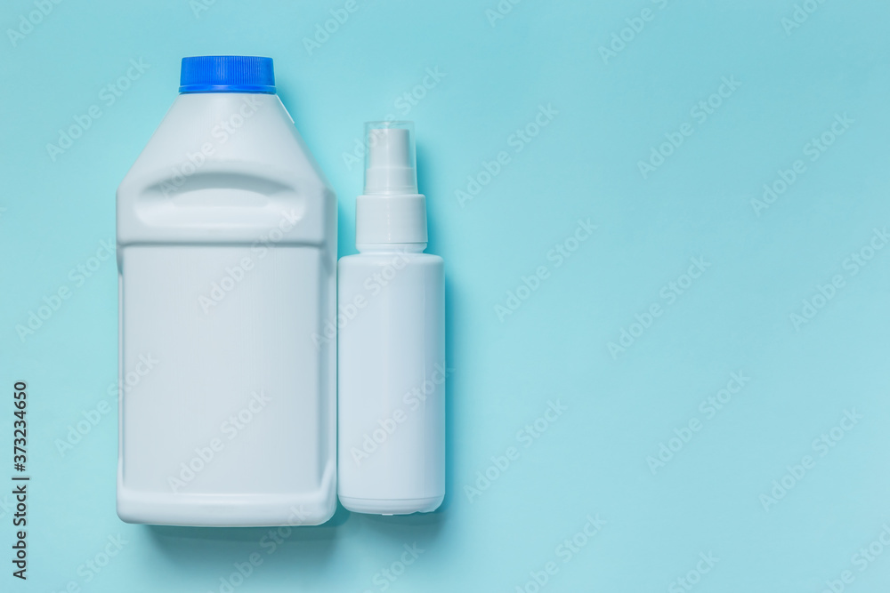 Plastic packaging, container layout, packaging product. White clean empty bottle for cosmetic, pharmaceutical, sanitary, detergent liquid with mockup on blue background with copy space Plastic packaging, container layout, packaging product. White clean empty bottle for cosmetic, pharmaceutical, sanitary, detergent liquid with mockup on blue background with copy space