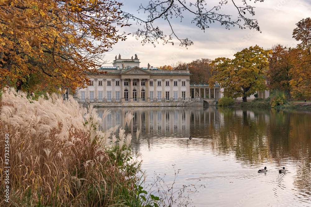 Pond and palace in Royal Baths Park in Warsaw