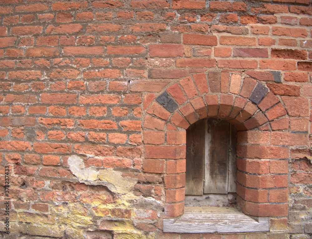 old brick wall with window background texture