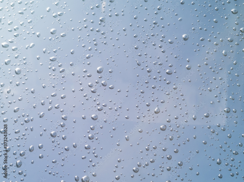 Rain drops on car window glasses surface. Natural Pattern of raindrops. Rain drops on car window glasses surface. Natural Pattern of raindrops.