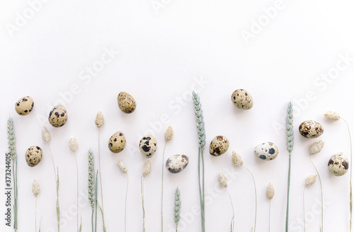 Wallpaper Mural Easter holiday background. Quail eggs and spikelets. Horizontal composition, top view. Minimal mock up with view from above. Torontodigital.ca