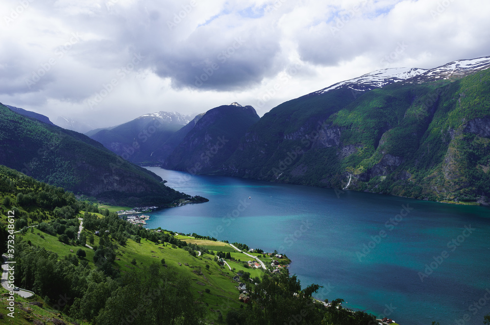 Famous Norwegian Fjord in the summer. Beautiful blue water. Aurlandsfjorden