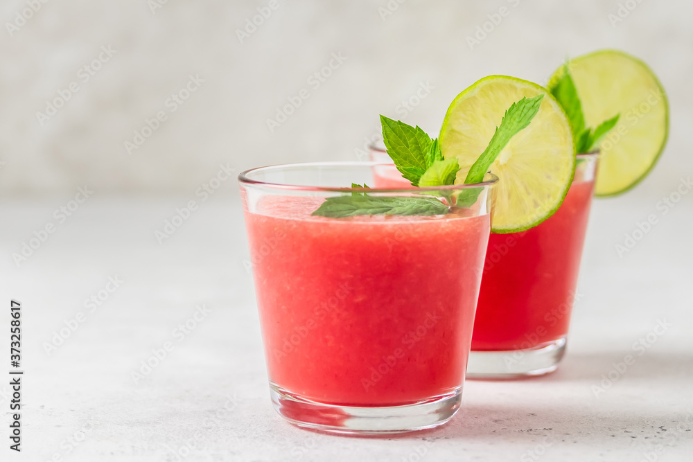 Summer party drink, watermelon lime mint smoothie. Space for text. Summer party drink, watermelon lime mint smoothie. Space for text.