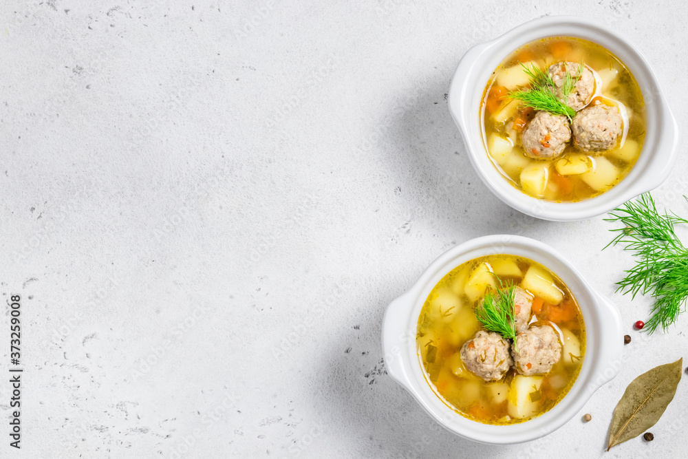 Classic homemade meatball soup. Space for text, top view. Classic homemade meatball soup. Space for text, top view.