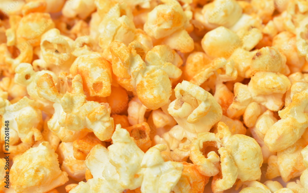 salty baked cheese popcorn arranging on white background salty baked cheese popcorn arranging on white background