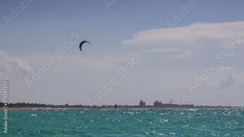 Beautiful shot of kitesurfing in a sea