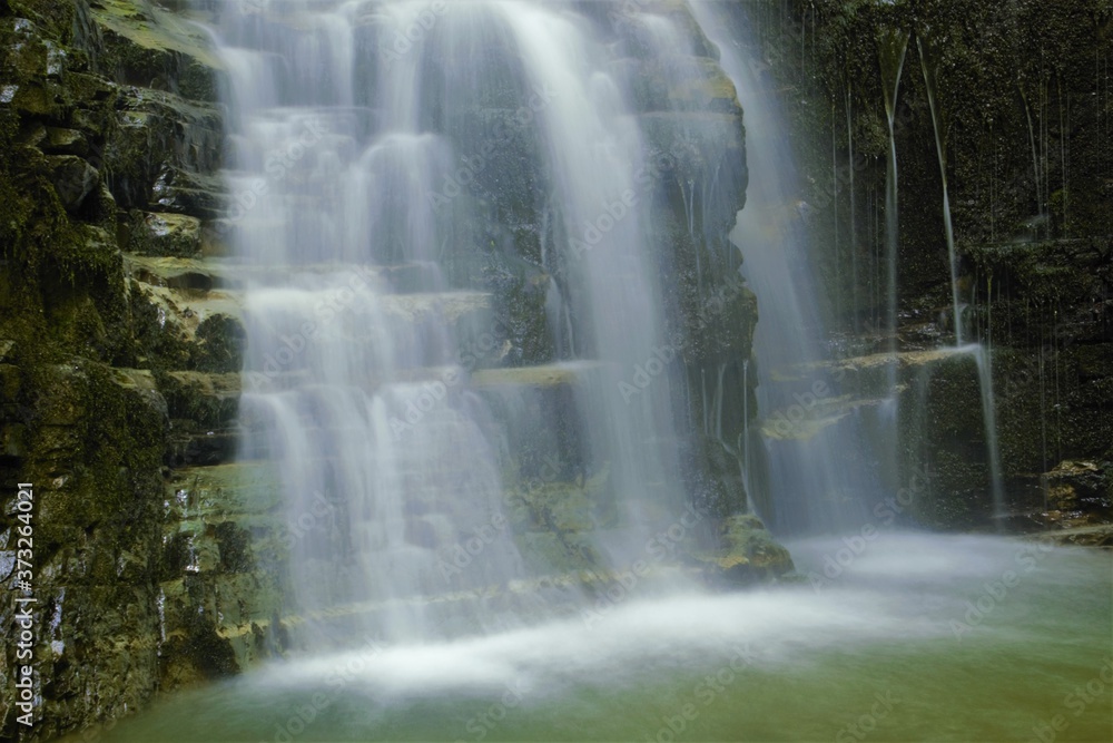 Fototapeta premium flow of water from a cliff