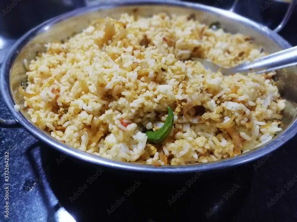 delicious Kerala egg biriyani(Special Indian dish) on a table delicious Kerala egg biriyani(Special Indian dish) on a table