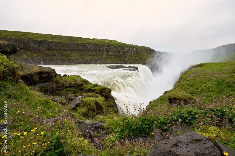 Beautiful landscape of part of the gullfoss waterfall seen from the side that belongs to the golden circle of iceland Beautiful landscape of part of the gullfoss waterfall seen from the side that belongs to the golden circle of iceland