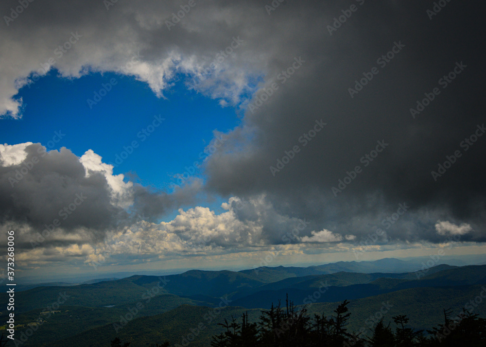 Fototapeta premium storm clouds over the mountains Mount Abraham VT 4000 Footer