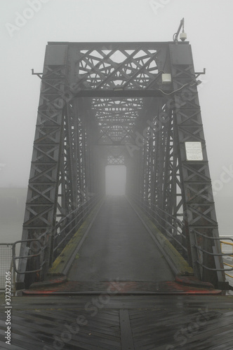 Tilbury Ferry Landing Stage Bridge in Mist photo