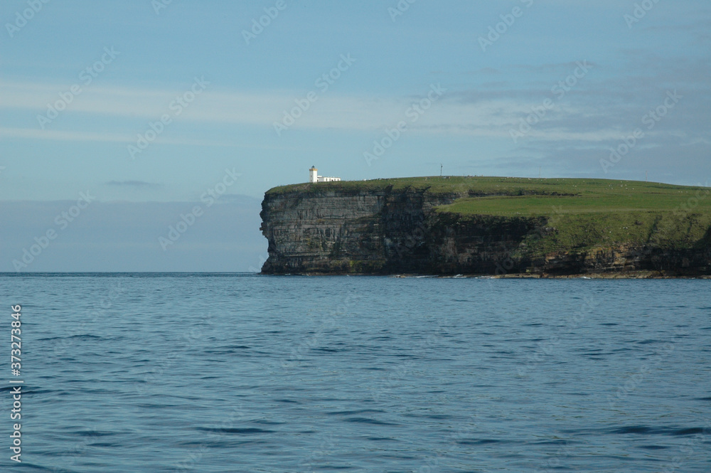 Lighthouse and Cliffs Lighthouse and Cliffs